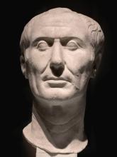 Carved marble sculpture of head of Julius Caesar.